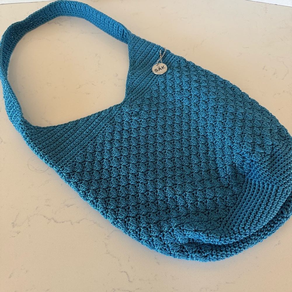 The Sak Hand-Crocheted Hobo Bag in Teal Blue